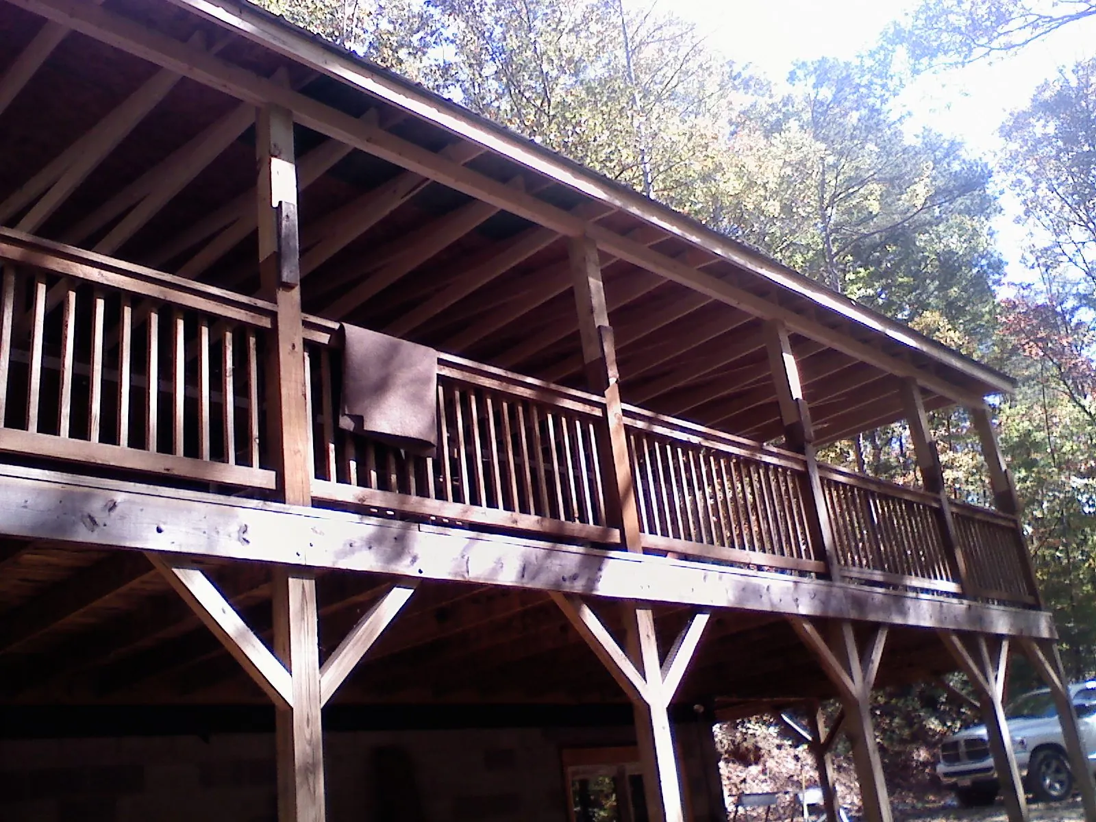 Timber framing under a new elevated porch and deck — Roof Leak Repair in Whiting by Roofing Brothers